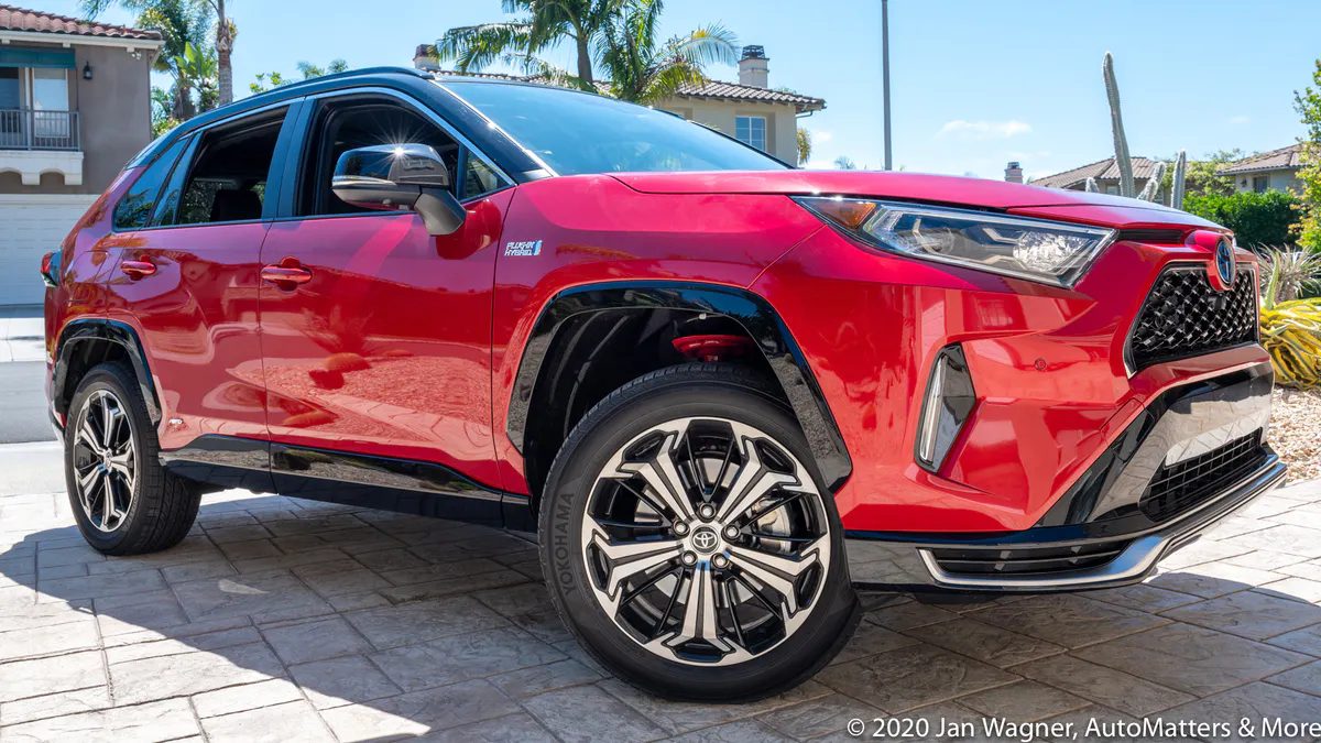 2​021 Toyota RAV4 Prime XSE in Supersonic Red with black roof