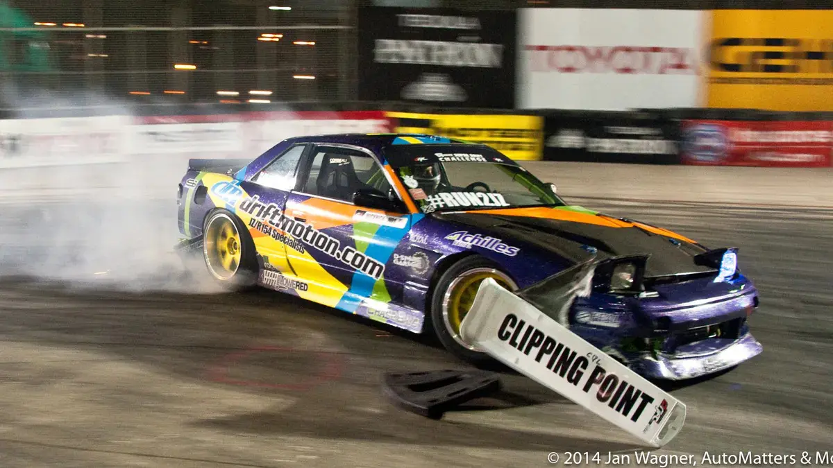 Clipping the clipping point: drifting at night at the 2014 Toyota Grand Prix of Long Beach (California).