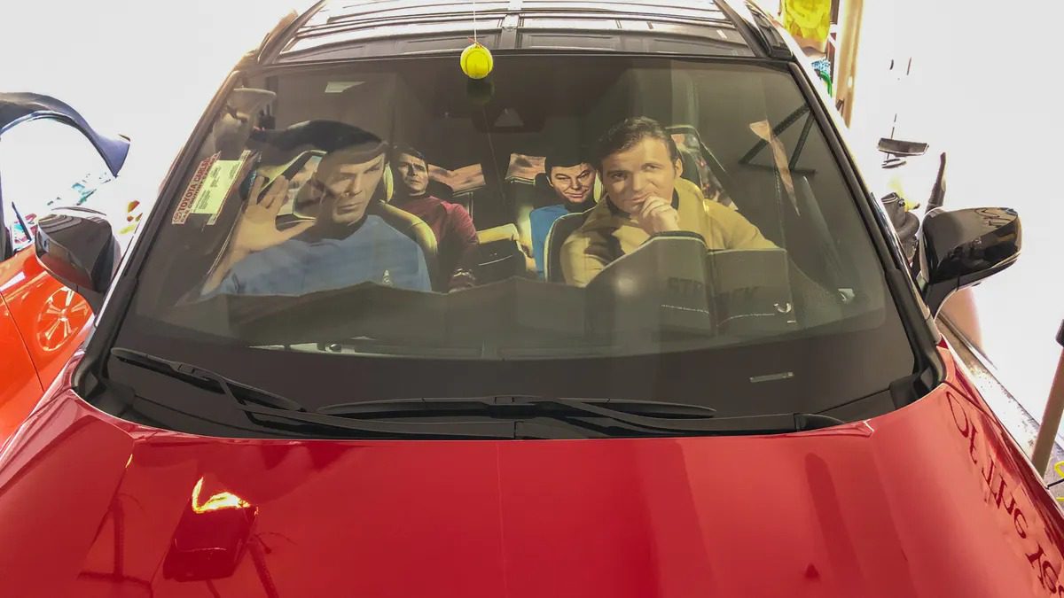 <span class="image-caption">Classic S​TAR TREK sunshade from TOYNK.com in my new 2021 RAV4 Prime XSE 'space' ship</span>