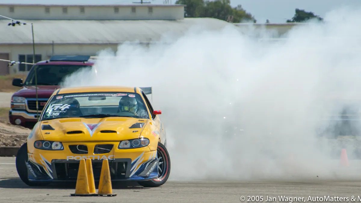 <span class="image-caption">Pontiac GTO professional drifting demo at a GM 'Ride & Drive' in 2005.</span>