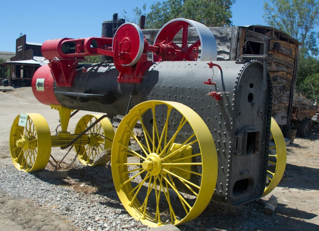 A yellow and black steam engine.