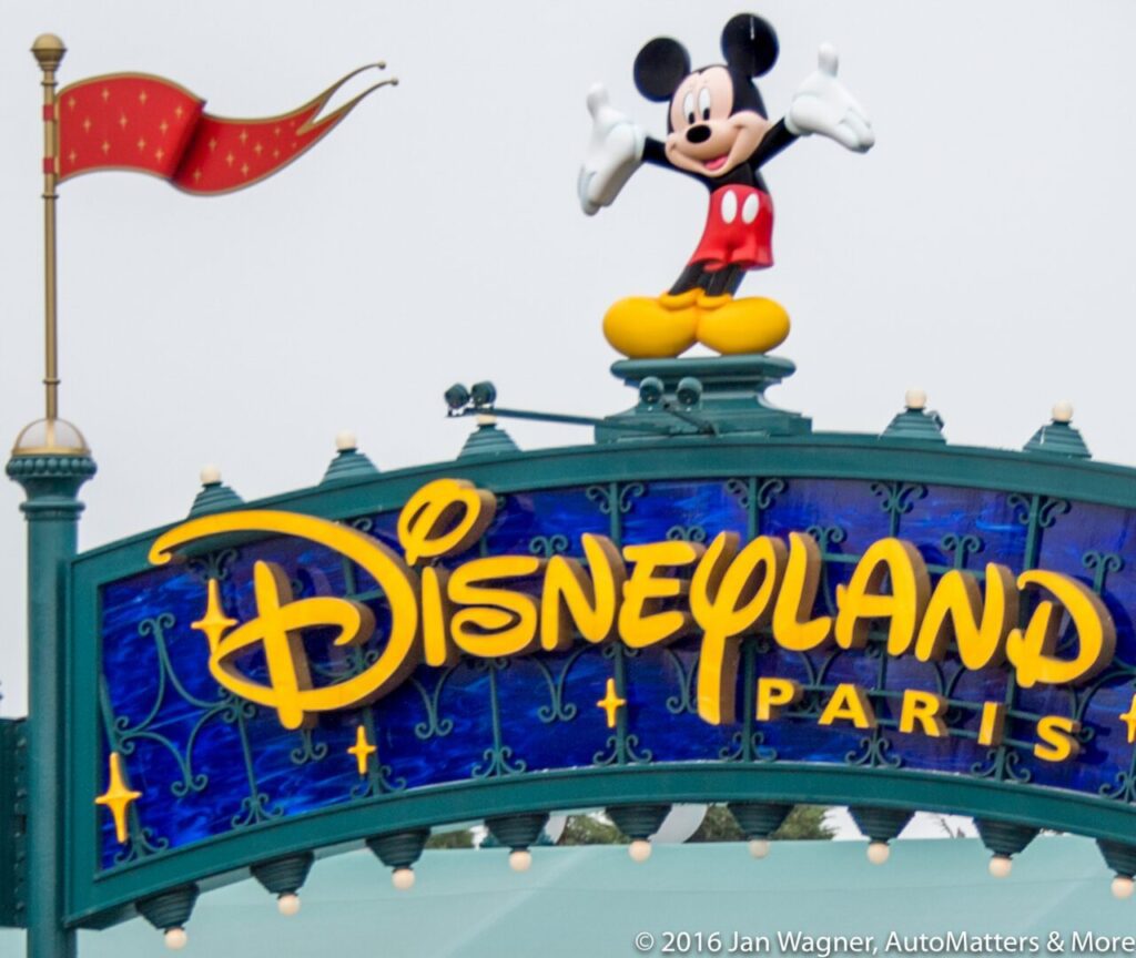 Disneyland paris sign with mickey mouse.