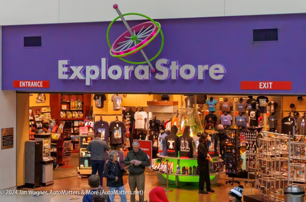 A store with a purple sign that says explore store.