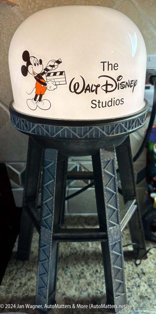 A mickey mouse lamp with the disney studios logo on it.