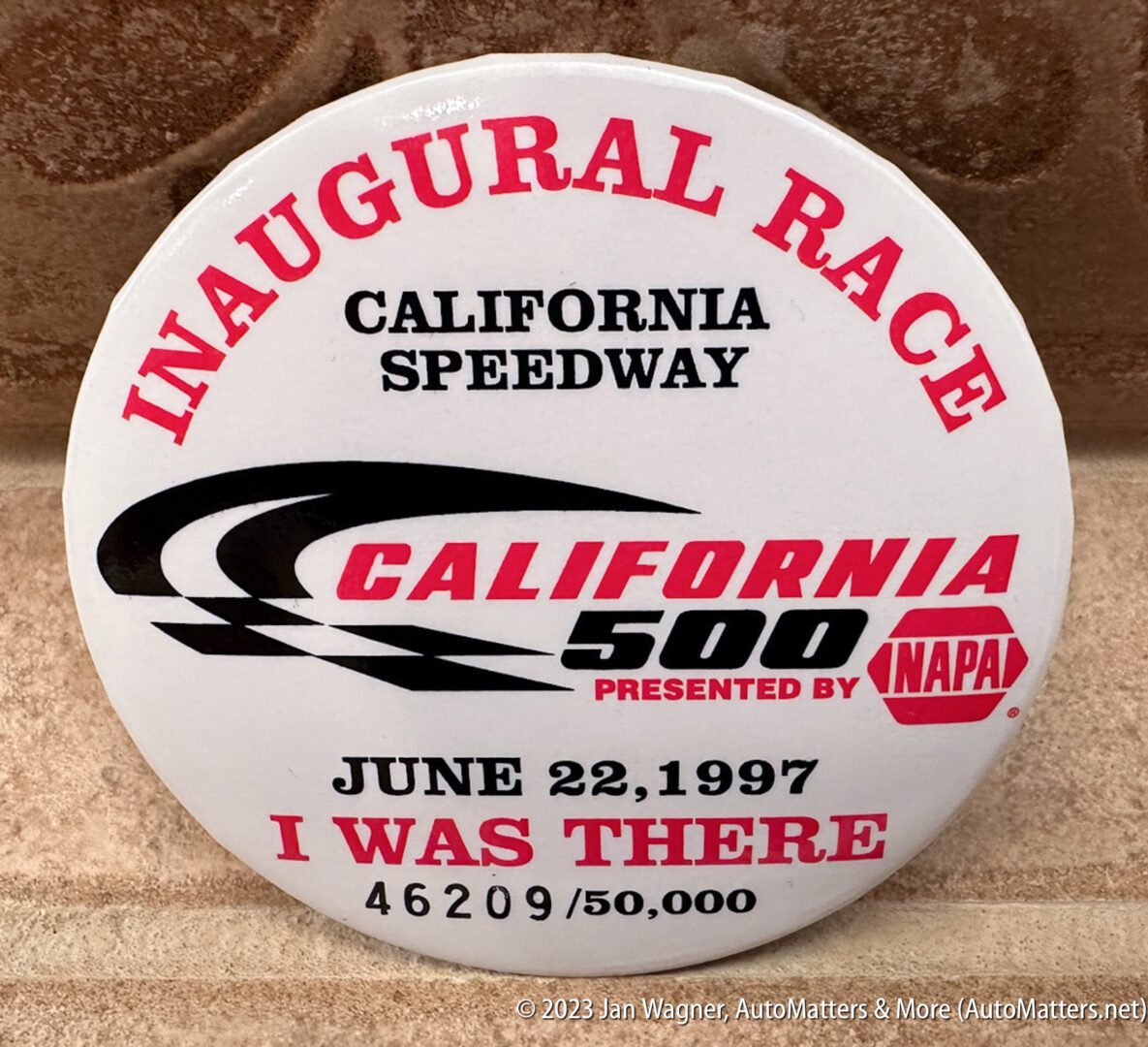 Round commemorative badge for the inaugural California 500 race at California Speedway on June 22, 1997, showing "I Was There" and serial number 46209/50,000.