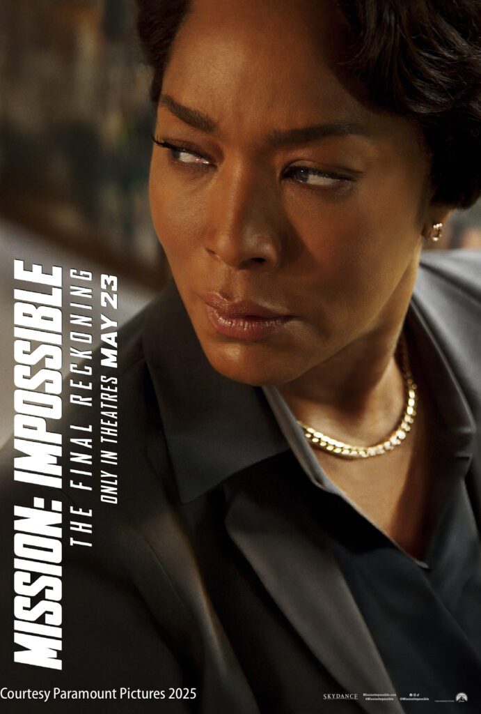 A woman in a suit looks to the side with a serious expression. Text on the image reads "Mission: Impossible – The Final Reckoning, only in theatres May 23.