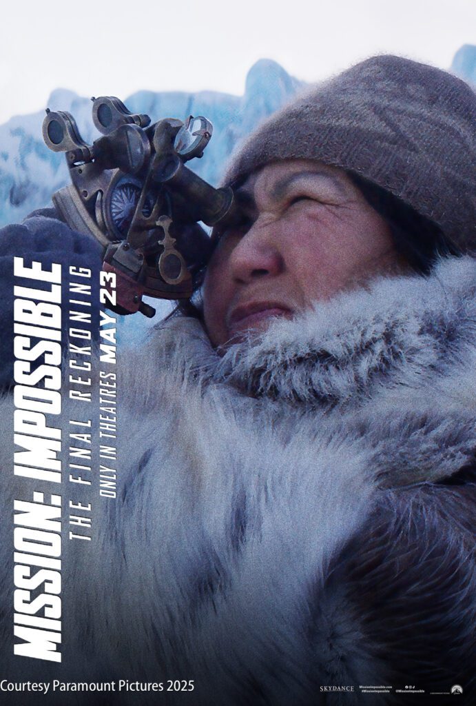A person in a fur coat looks through a vintage scope in a snowy landscape. "Mission: Impossible – The Final Reckoning" film details are displayed on the left.