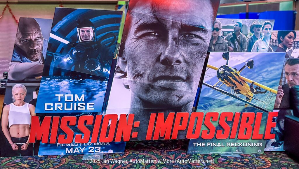 Large promotional display for "Mission: Impossible – The Final Reckoning" featuring Tom Cruise, action scenes, and the film’s release date, May 23, 2025.