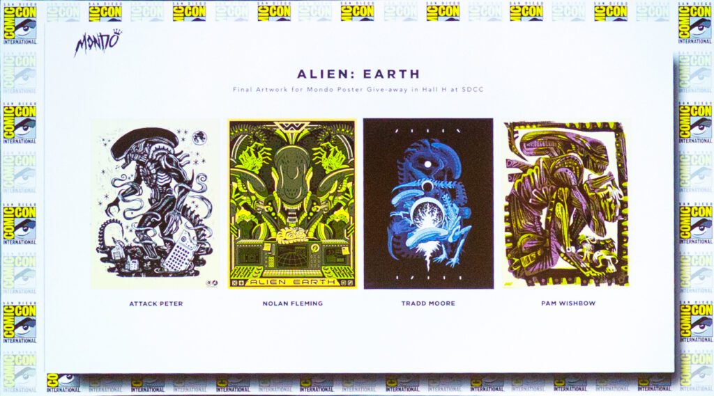 A display of four illustrated "Alien: Earth" posters by different artists, shown at San Diego Comic-Con, with each poster featuring a unique depiction of the Alien creature.