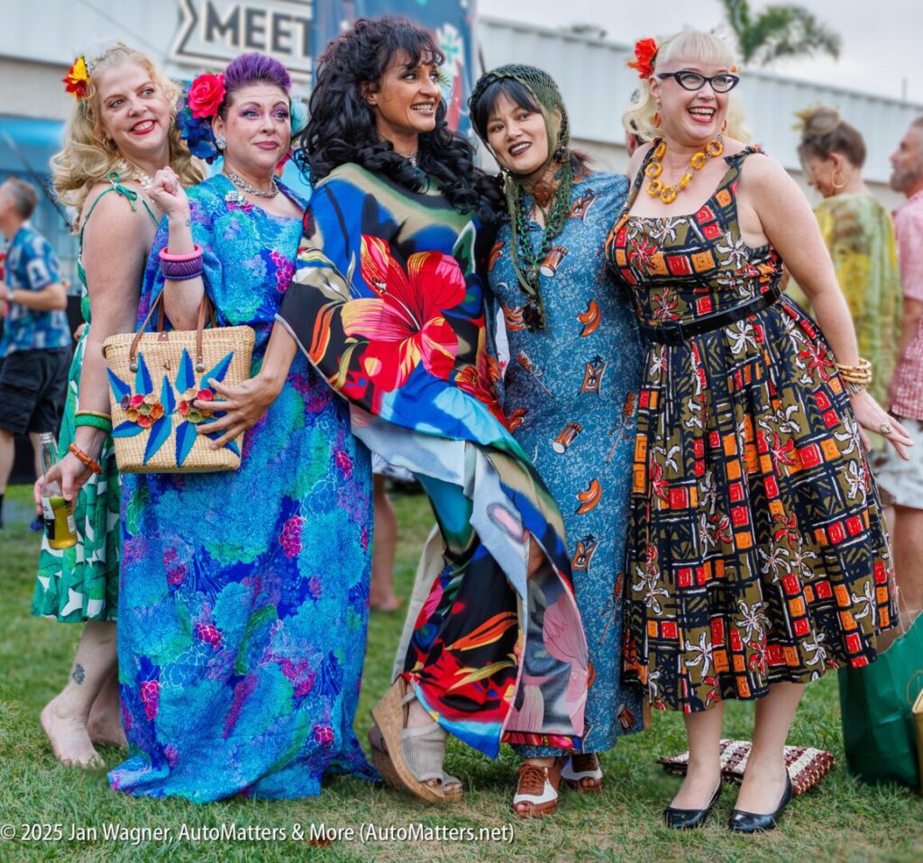 A group of women in colorful dresses.