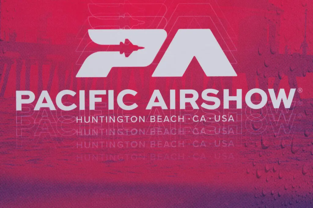 A Pacific Airshow logo with a jet silhouette, white text reading "Pacific Airshow, Huntington Beach, CA, USA," on a red and purple background.