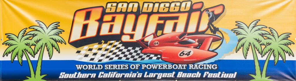 Banner for San Diego Bayfair promoting the World Series of Powerboat Racing and Southern California's largest beach festival, featuring palm trees and a red powerboat.