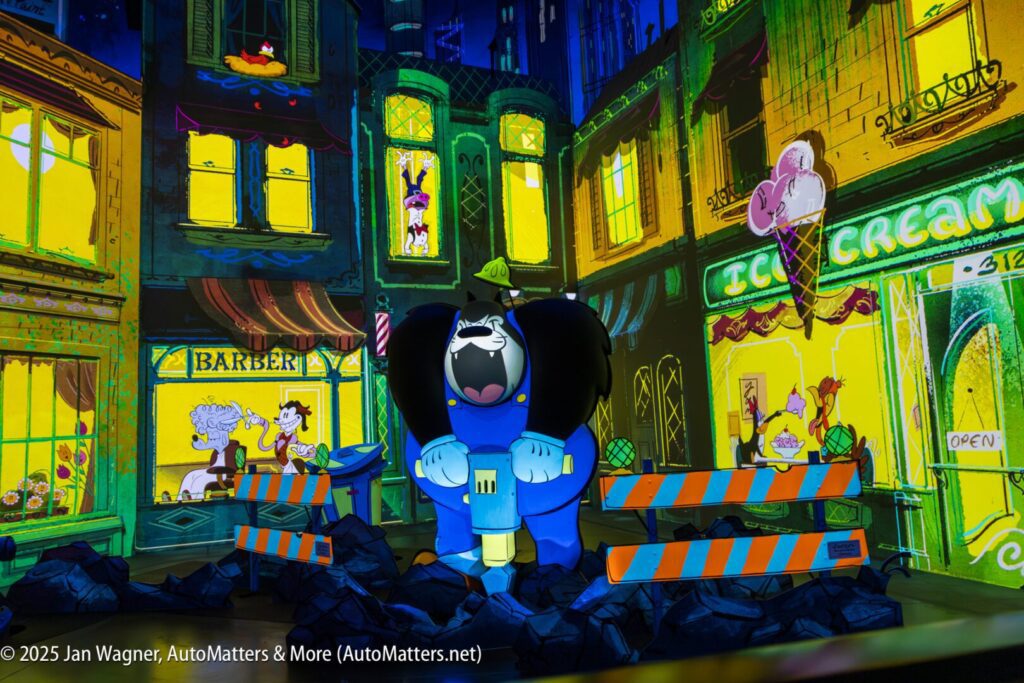 Colorful animated scene showing a cartoon dog character in a blue uniform yelling in front of a barber shop and ice cream parlor at night, with construction barriers and rubble.
