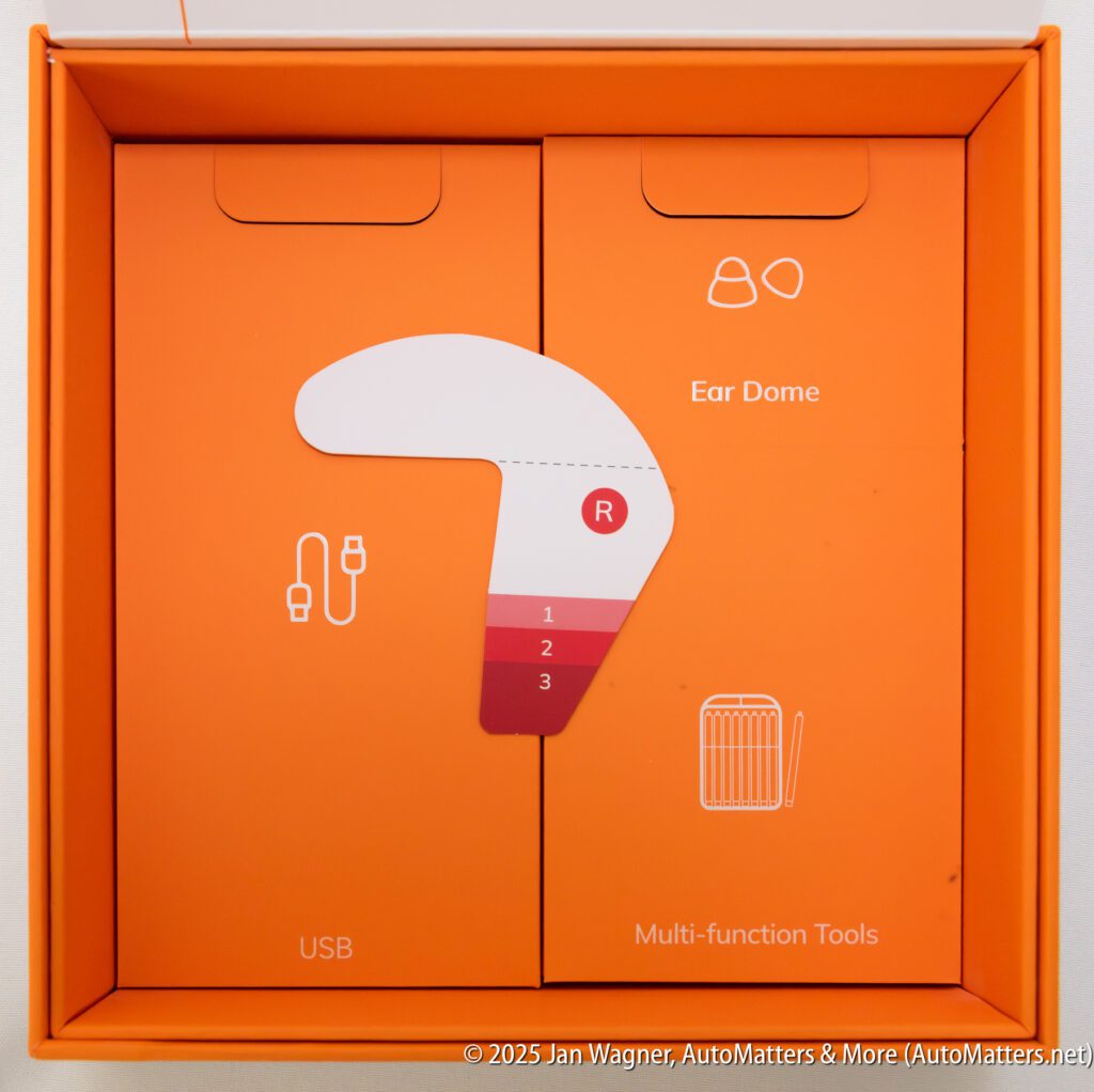 An orange box contains two compartments labeled "USB" and "Multi-function Tools," with icons and “Ear Dome” text, plus an illustration with numbered levels and a red "R" mark.