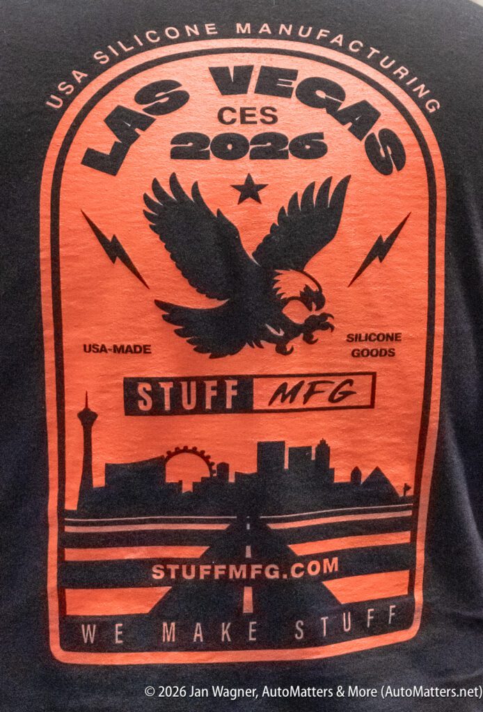 A black and orange t-shirt graphic features a bald eagle, "Las Vegas CES 2026," city skyline, and "STUFF MFG" branding for USA-made silicone goods.