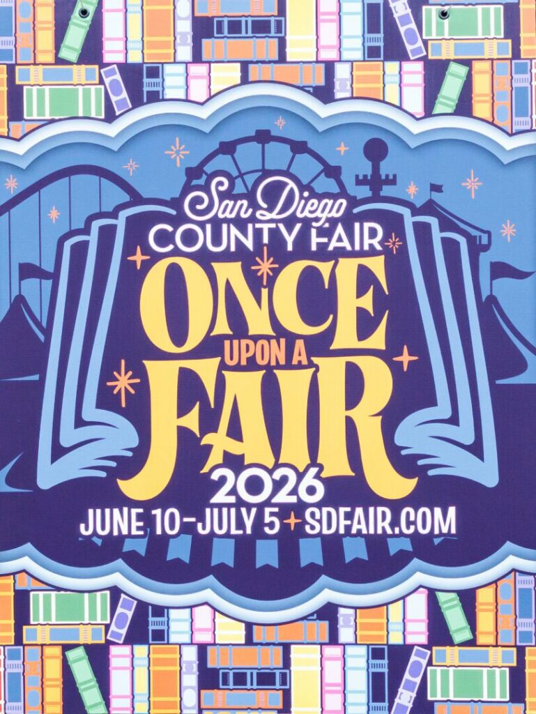 Poster for the 2026 San Diego County Fair themed "Once Upon a Fair," with event dates June 10–July 5 and the website sdfair.com. Colorful background with books and a fairground silhouette.
