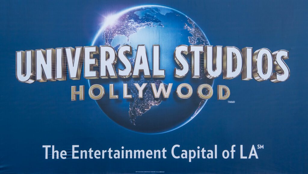 Universal Studios Hollywood logo over a globe, with the tagline "The Entertainment Capital of LA" on a blue background.