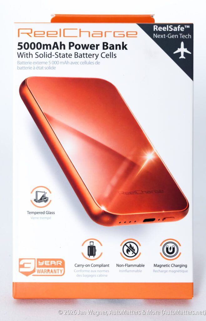 Orange 5000mAh power bank in packaging highlights features like tempered glass, carry-on compliance, non-flammable design, magnetic charging, and a 3-year warranty.