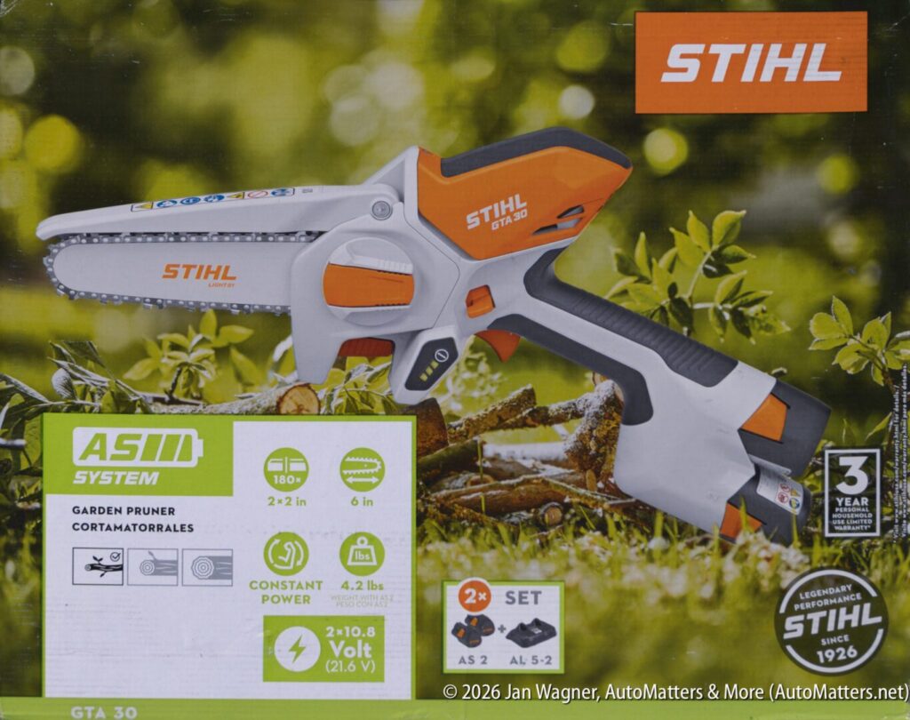 STIHL GTA 26 cordless garden pruner displayed in packaging, highlighting features like constant power, 21.6V battery, 4.1 lb weight, 3-year warranty, and AS System compatibility.