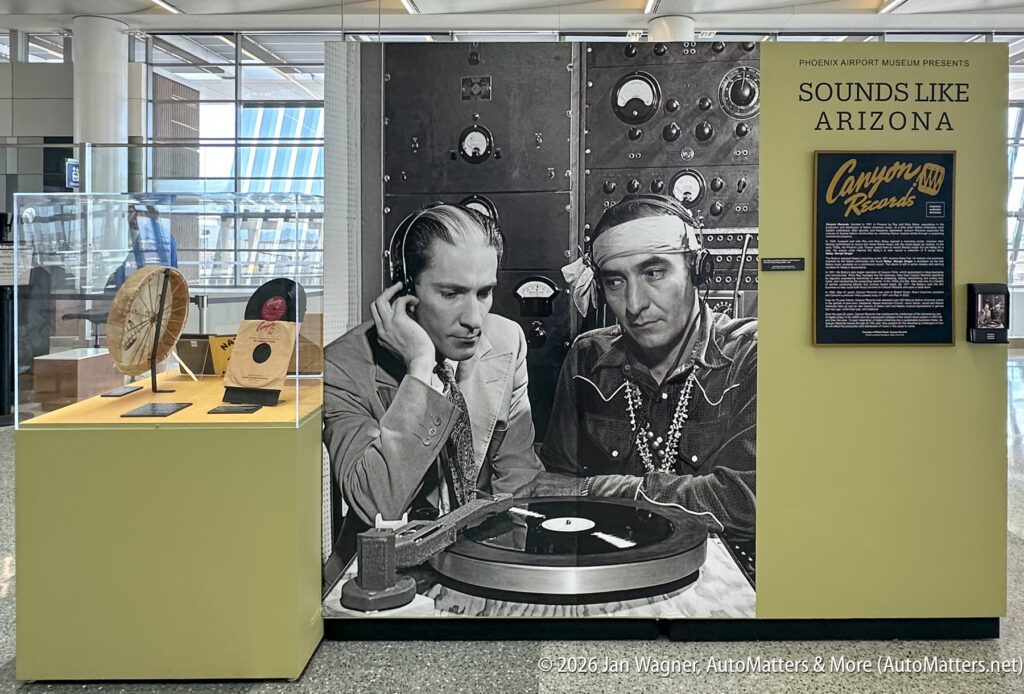 Exhibit at Phoenix Airport Museum features Canyon Records, with a large black-and-white photo, display cases, and a “Sounds Like Arizona” sign.