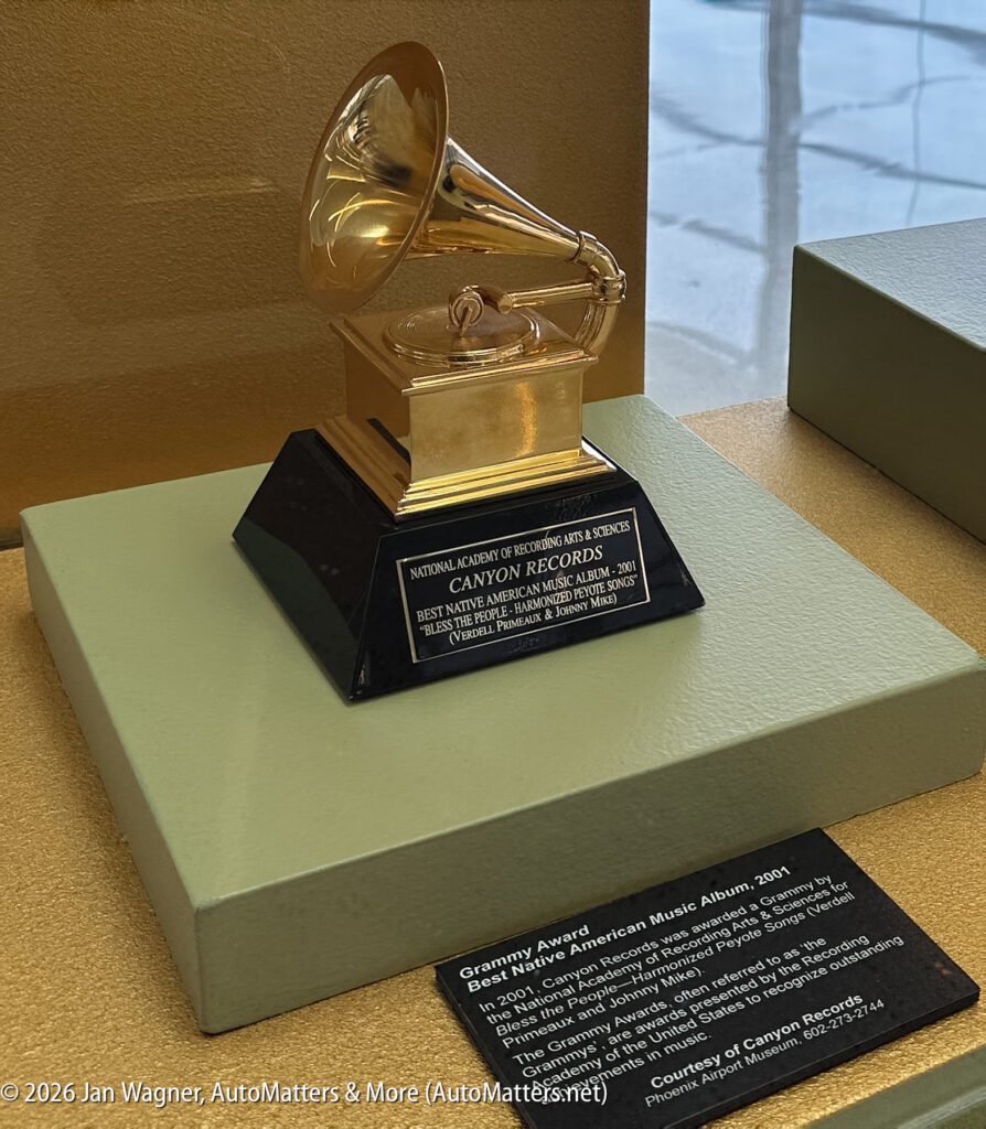 A Grammy Award for Best Native American Music Album sits on display, with a plaque describing the recipient Canyon Records and the winning album “People of the Willows” from 2002.