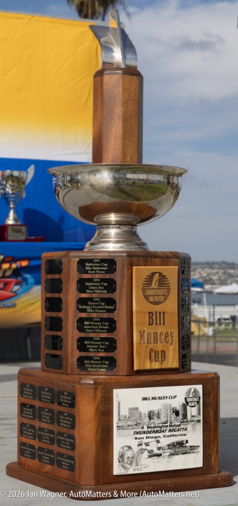 The Bill Muncey Cup trophy featuring engraved winner plaques and a commemorative plaque depicting the Washington Mutual Thunderboat Regatta.