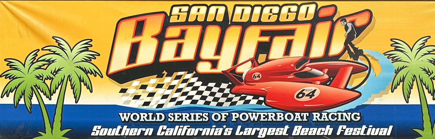 San Diego Bayfair event banner featuring a hydroplane boat, a person on a flyboard, and palm trees. Text reads: “San Diego Bayfair, World Series of Powerboat Racing, Southern California’s Largest Beach Festival.”.